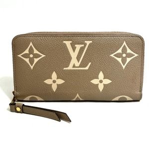 LOUIS VUITTON Cream Monogram Leather Wallet